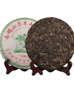 Yunnan Nannuo Mountain Qiaomu Gereifter Roher Teekuchen 357g Dunkelbraun in Der Farbe Und Weich Im Geschmack